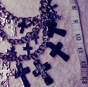 Silverstone triple strand crosses necklace.  Heavier than most but beautiful!